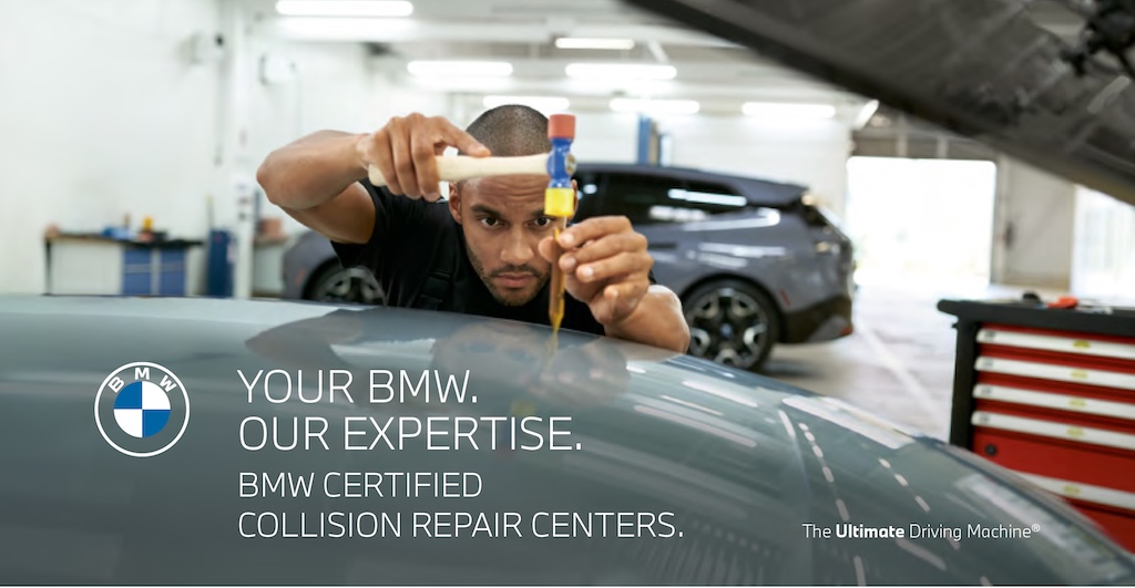 BMW Collision Repair Center Expert Fixing Vehicle Dent